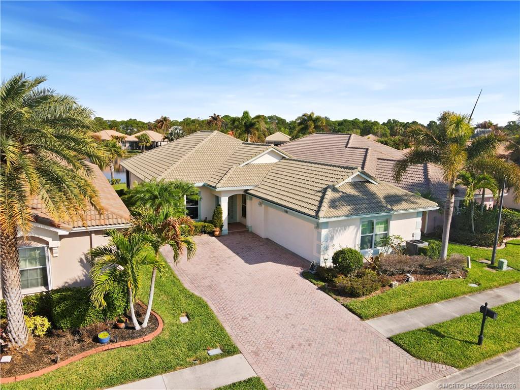 1661 NW Old Oak Terrace, Jensen Beach FL — aerial view of the home in Jensen Beach Country Club